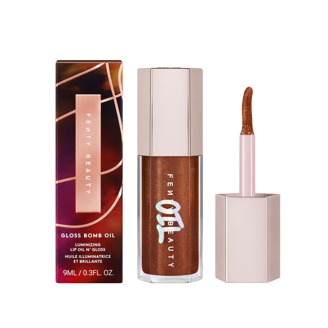 Fenty Beauty Gloss Bomb Oil with packaging on a white background